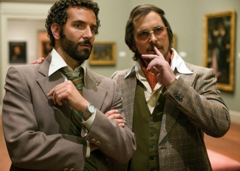 Bradley Cooper y Christian Bale protagonizan una película que narra parte de una época llena de estafadores de la más baja calaña.